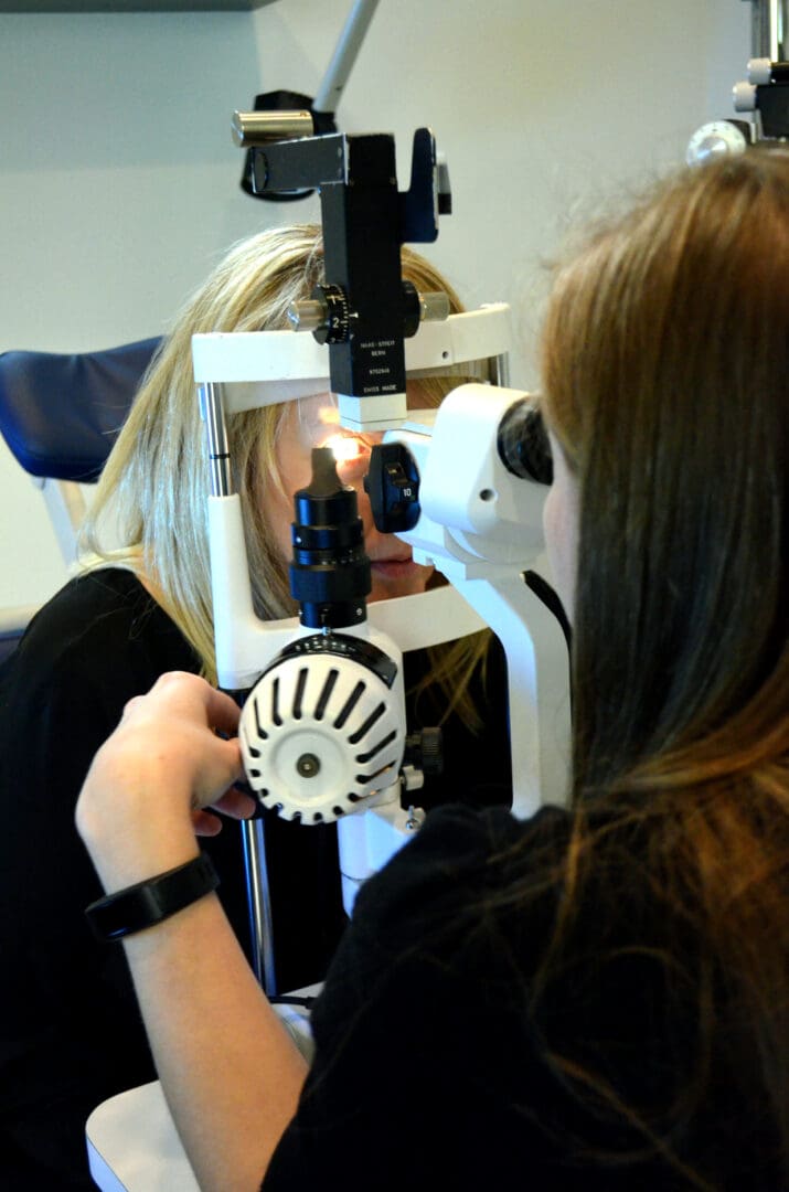 Woman taking an eye test